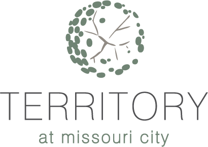 A logo with a tree and the words "TERRITORY at missouri city".